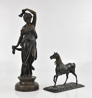 Lot 1502 - A bronzed spelter model of a horse, on...