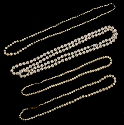 Lot 305 - Four cultured pearl necklaces, one example...