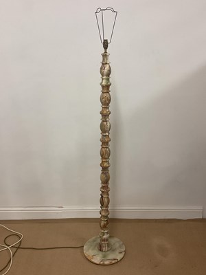 Lot 335 - A late 20th century onyx standard floor lamp,...