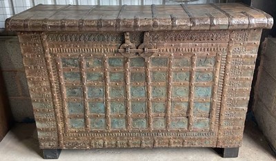 Lot 369 - A large Eastern strap bound chest, width 131cm.