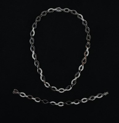 Lot 207 - CARTIER; an impressive 18ct white gold and...