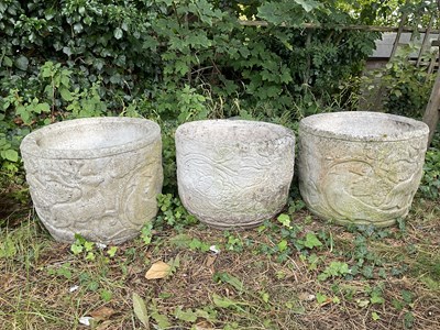Lot 1226 - Three reconstituted stone planters, each...