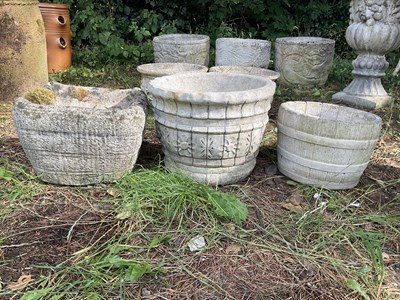 Lot 1235 - Three reconstituted stone planters, two...
