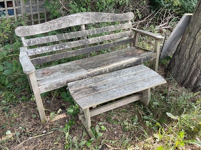 Lot 1233 - A wooden garden bench, length 158cm, with...