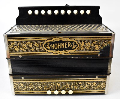 Lot 625 - A boxed Hohner melodian, wooden with chrome...