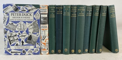 Lot 269 - ARTHUR RANSOME; a collection of eleven books.