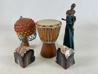 Lot 103 - A djembe African drum, a shekere, a figure of...