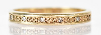 Lot 817 - A 9ct yellow gold ring set with six small...