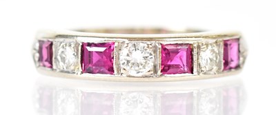 Lot 781 - An 18ct yellow gold ring, set with four square...