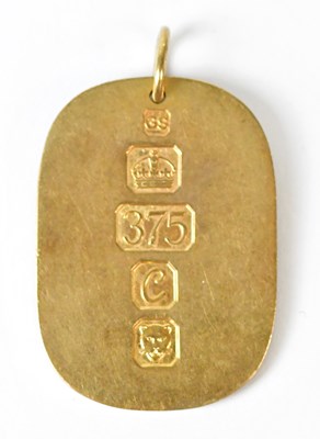 Lot 857 - A 9ct gold pendant with decorative hallmarks,...