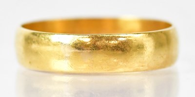 Lot 779 - A 22ct gold wedding band, size Y, approx. 5.9g.