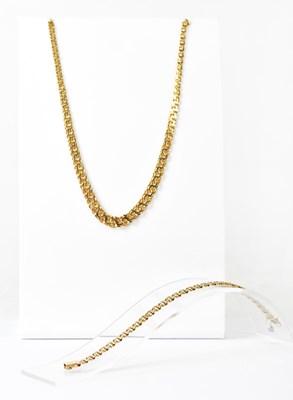 Lot 885 - A 9ct gold double curb link necklace, length...