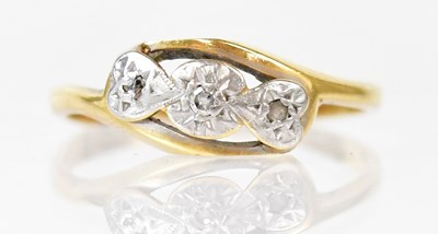 Lot 794 - An 18ct ring with small diamonds set in...