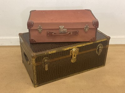 Lot 52 - A brass bound travel trunk with faux crocodile...