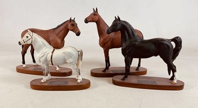 Lot 374 - BESWICK; four models of horses on plinths, to...