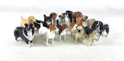 Lot 157 - BESWICK; twelve dog figures, including beagle,...