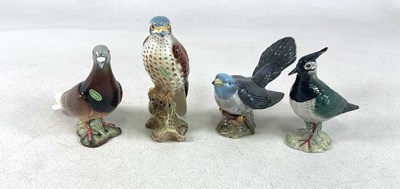 Lot 165 - BESWICK; four bird figures, comprising pigeon,...