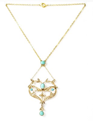 Lot 850 - An Edwardian 9ct gold pendant set with...