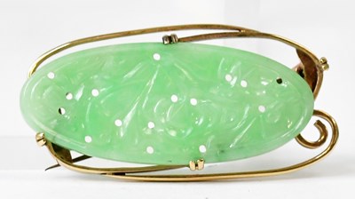 Lot 841 - A yellow metal oval brooch set with an oval...