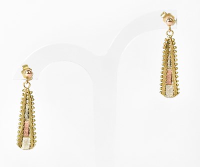 Lot 879 - A pair of white, rose and yellow gold drop...