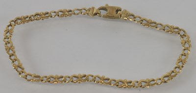 Lot 570 - A 9ct yellow gold flat link bracelet, length...