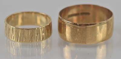 Lot 491 - A 9ct yellow gold wedding band, size Z, and a...