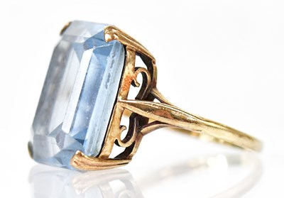 Lot 814 - A 9ct gold ring set with large pale blue topaz,...