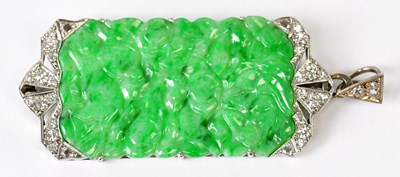 Lot 847 - An Art Deco white metal pendant brooch set...