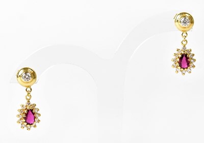 Lot 880 - A pair of yellow metal cluster drop earrings,...