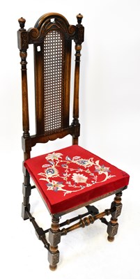 Lot 97 - A Carolean-style bergère backed dining chair...