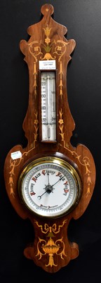Lot 145A - An Edwardian inlaid rosewood aneroid barometer...