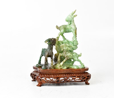 Lot 356 - A Chinese jade carving of three goats or rams...