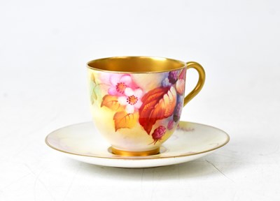 Lot 280 - ROYAL WORCESTER; a cup and saucer by Kitty...