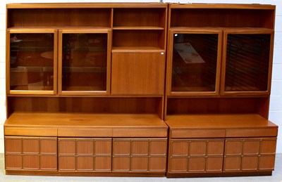 Lot 51 - MCINTOSH; two mid-20th century teak wall units,...
