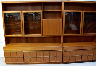 Lot 51 - MCINTOSH; two mid-20th century teak wall units,...