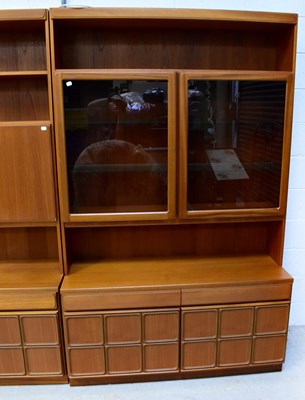 Lot 51 - MCINTOSH; two mid-20th century teak wall units,...
