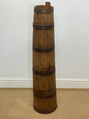 Lot 356 - A metal bound coopered butter churn, height 95cm.