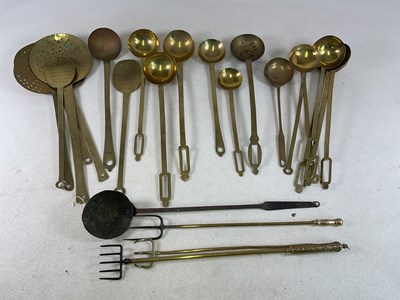 Lot 132 - A quantity of brass fire place tools,...