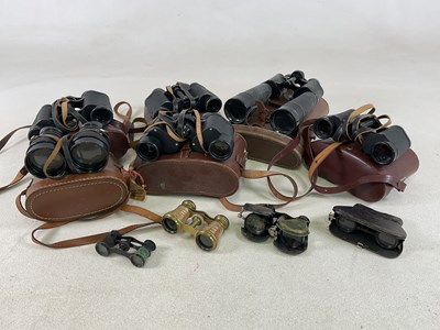 Lot 45 - A collection of binoculars and opera glasses.