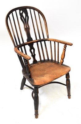 Lot 81 - A 19th century ash and elm Windsor chair with...