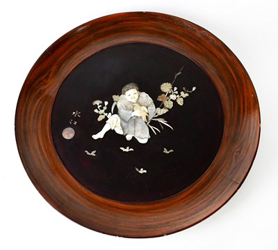 Lot 389A - A Japanese Shibayama roundel depicting a boy...