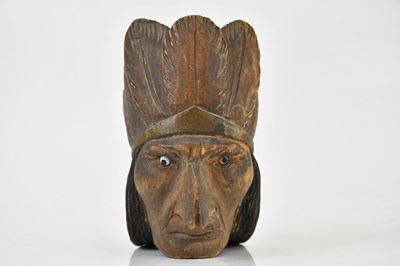 Lot 1535 - A late 19th century carved wooden pipe head in...