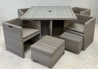 Lot 233 - A modern garden table with glass top and four...