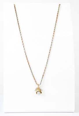 Lot 856 - A 9ct rose and white gold chain link necklace...