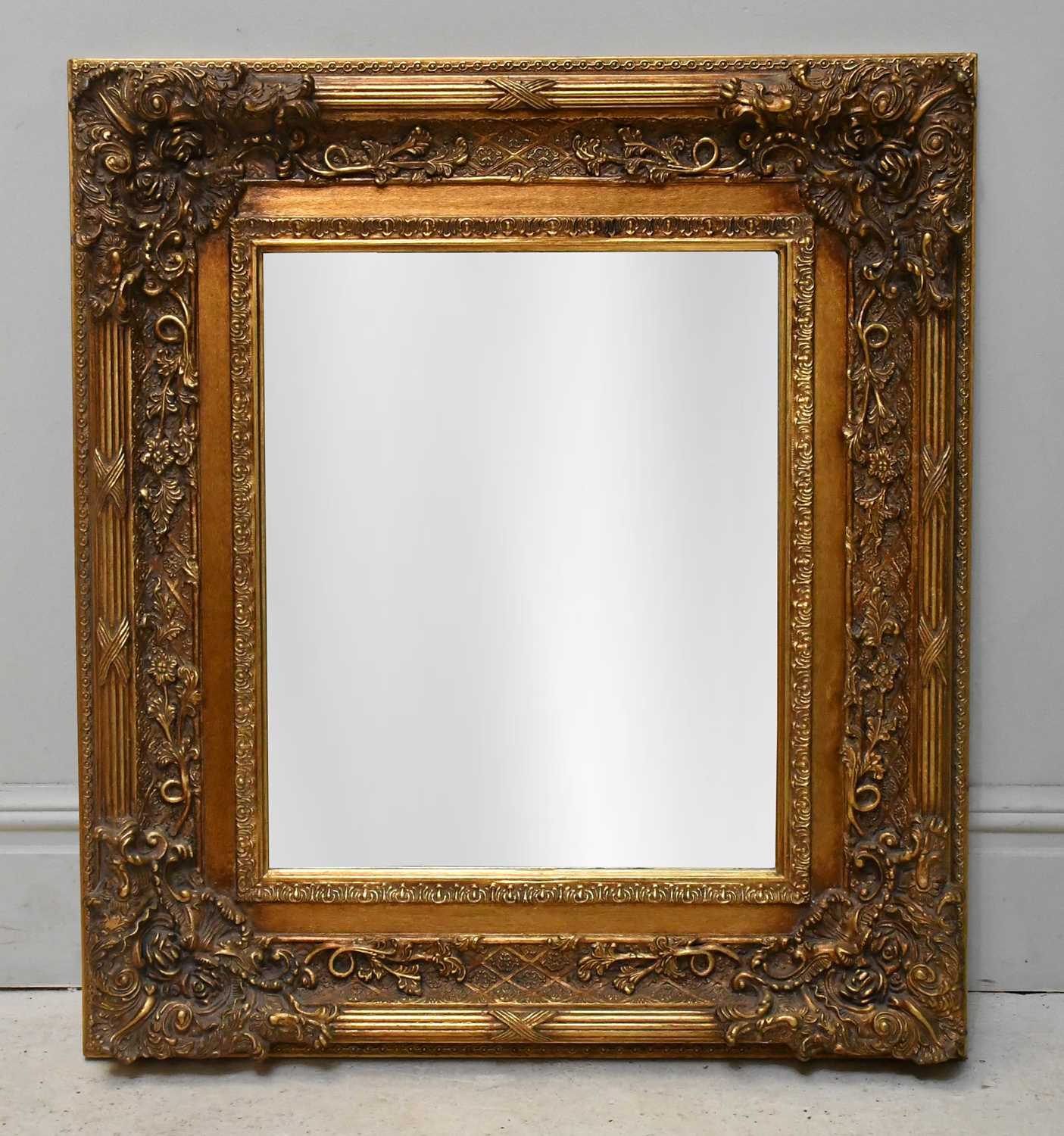 Lot 25 - A decorative gilt framed rectangular wall