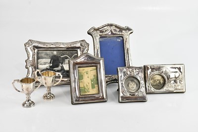 Lot 502 - Five white metal and silver plated photograph...