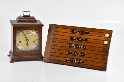 Lot 276 - A modern burr walnut cased mantel clock, the...