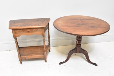 Lot 172 - A Georgian mahogany tilt-top tripod table, and...