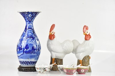 Lot 1544 - A pair of contemporary Chinese ceramic models...