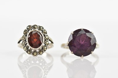 Lot 557 - A continental white metal dress ring, set with...